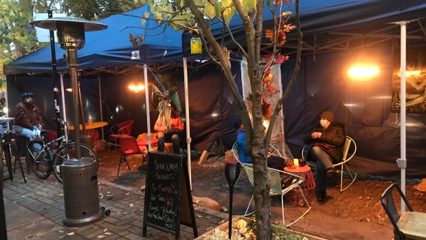 To help restaurants and bars survive winter, let’s make it easy to use car space for seating