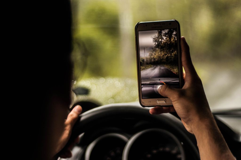 The Real Reason Why So Many Americans Drive Distracted