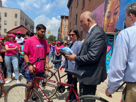 Old Bikes + New Immigrants = Warm Welcome